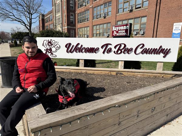 Student and therapy dog
