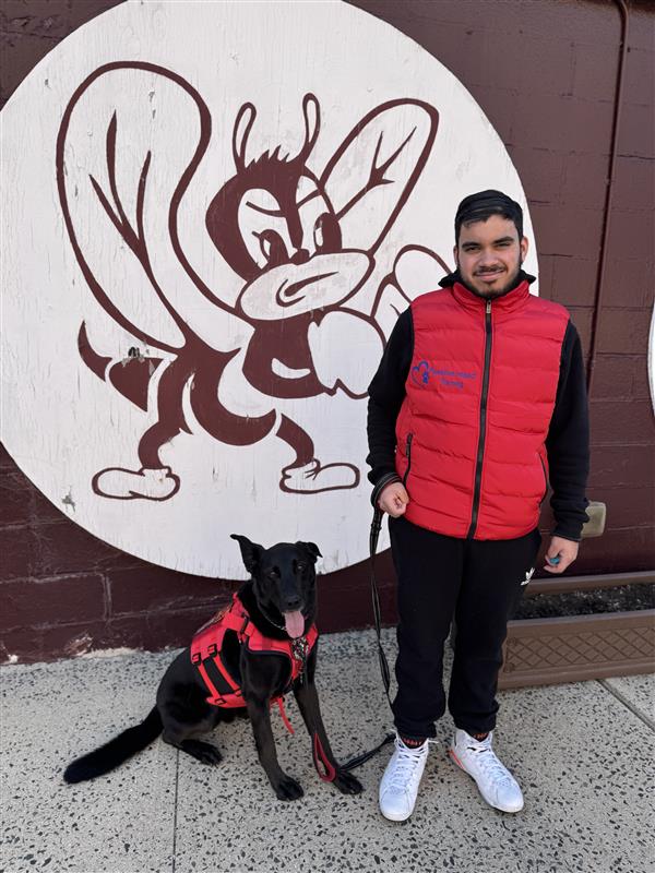 Student and therapy dog